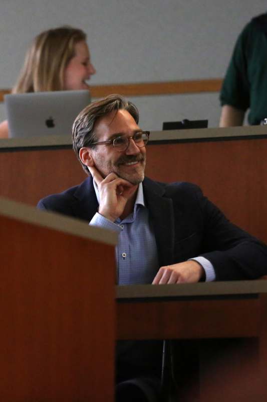 a man sitting at a desk