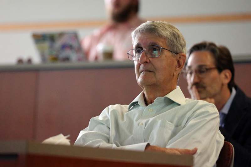 a man in a white shirt