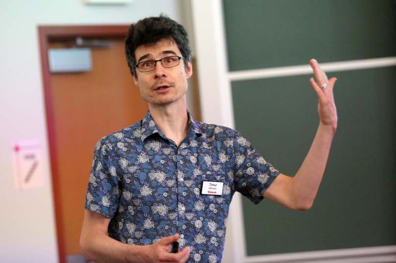 a man in a blue shirt