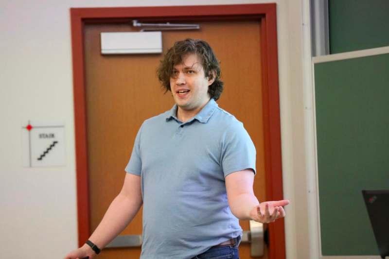 a man standing in front of a door