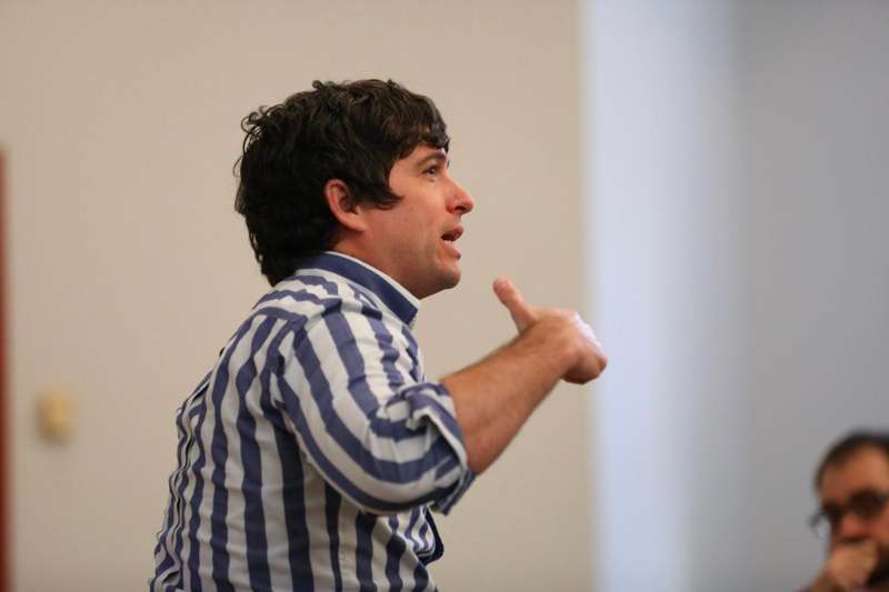 a man in a striped shirt