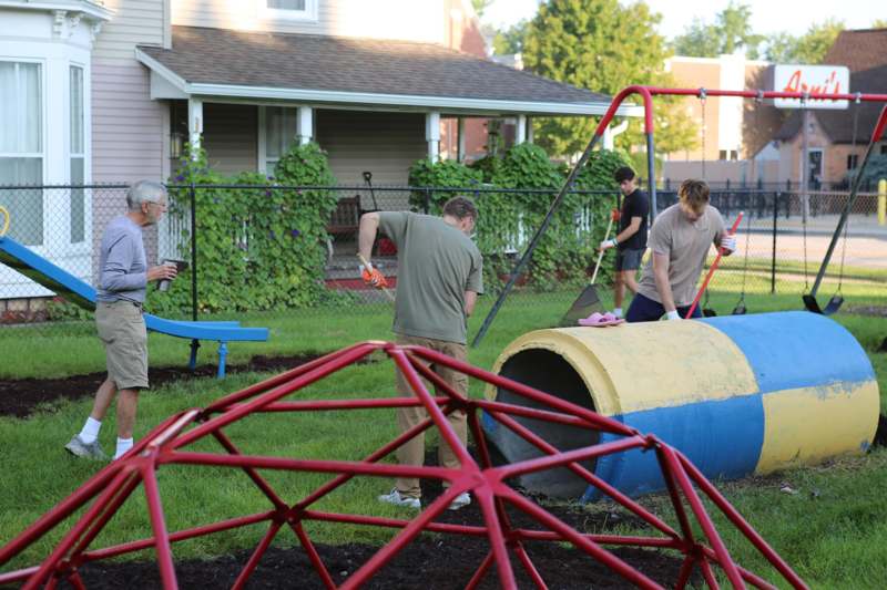 a group of people in a yard
