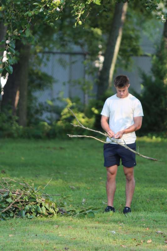 a man holding a stick in his hand