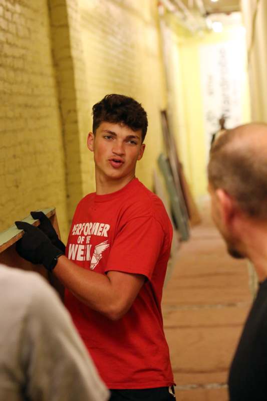a man in a red shirt