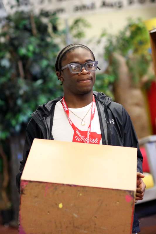 a man holding a box