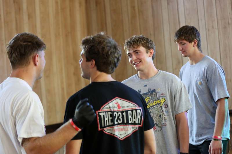 a group of men standing in a circle