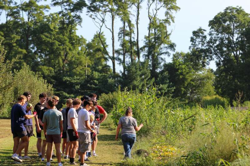 a group of people standing in a line