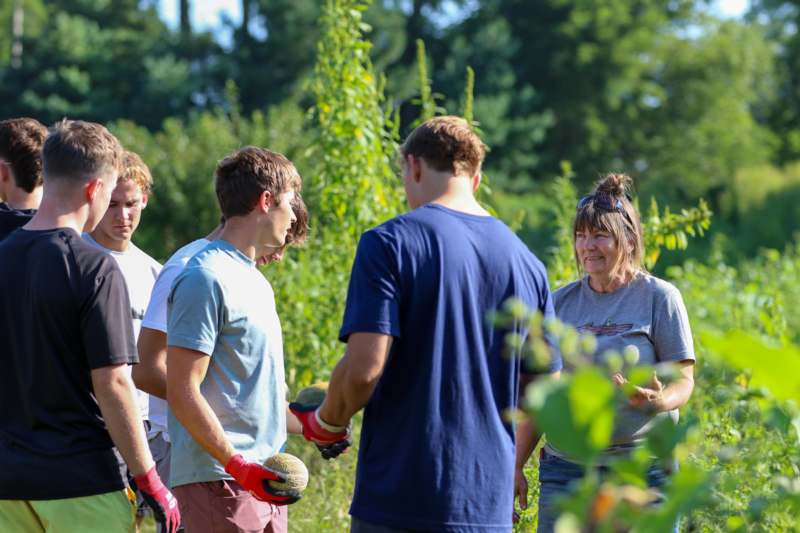 a group of people in a garden