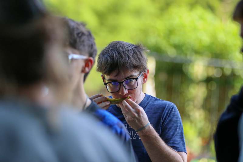a man eating a piece of food