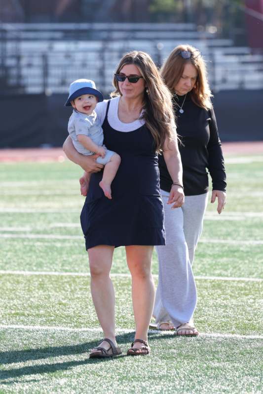a woman holding a baby