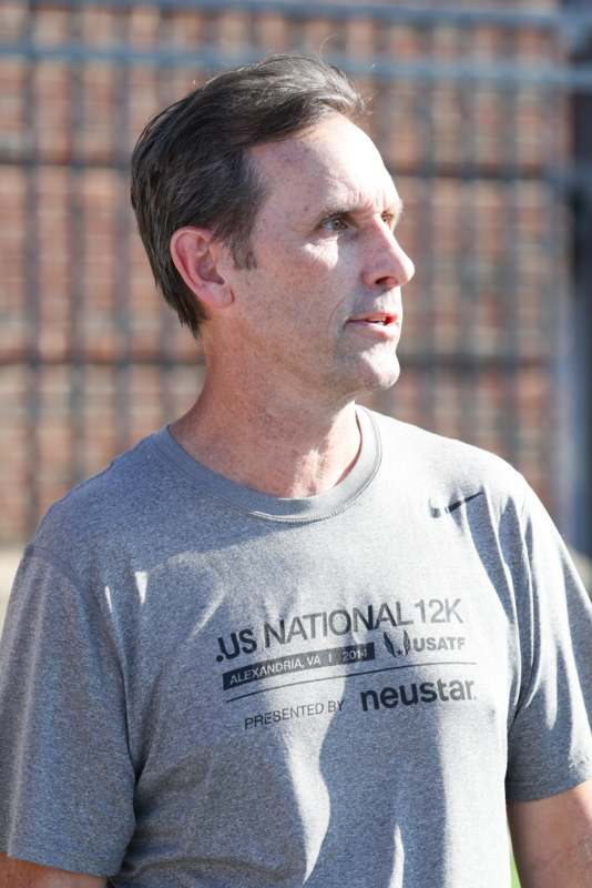 a man in a grey shirt