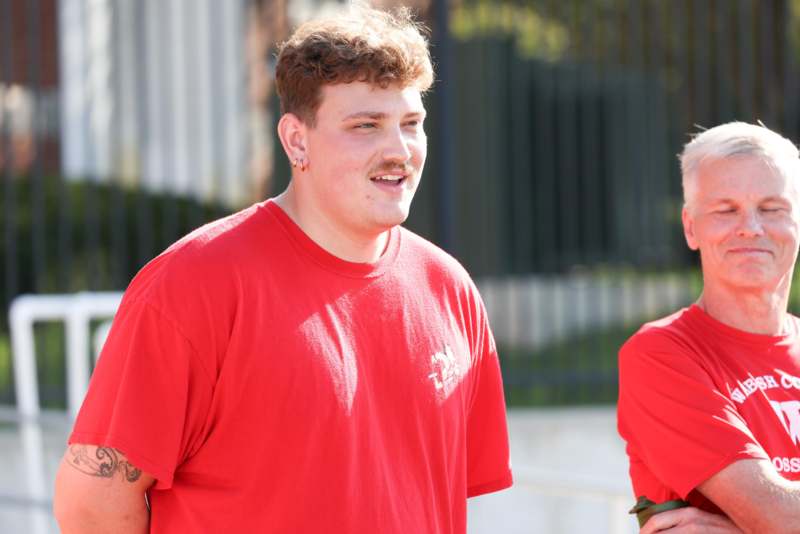a man in red shirt