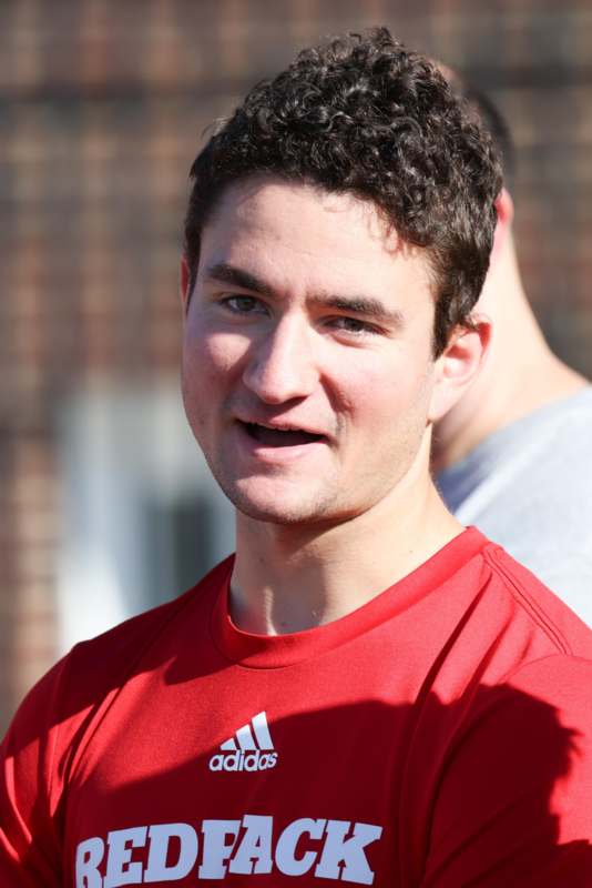 a man in a red shirt