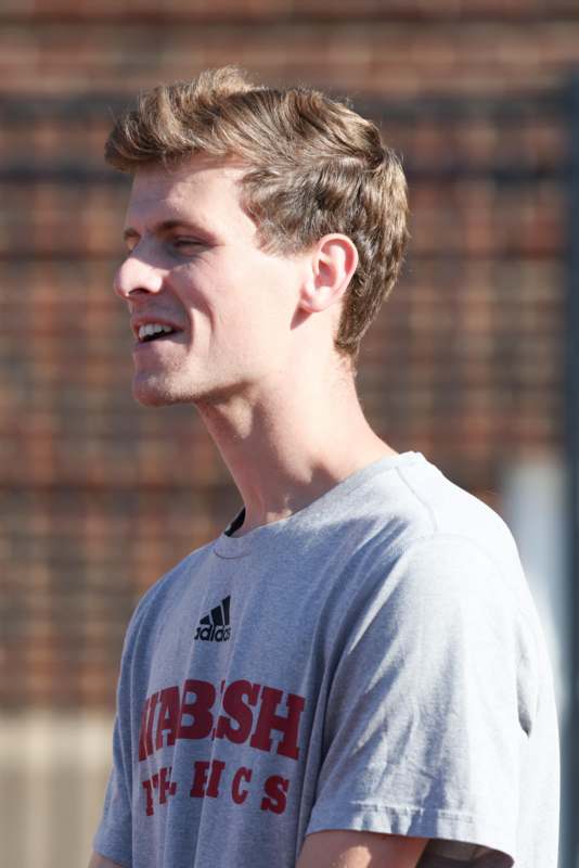 a man in a grey shirt