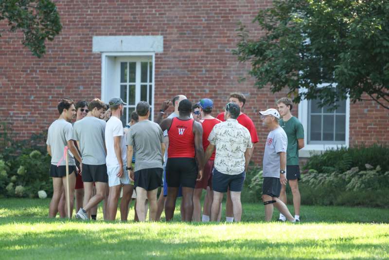 a group of people standing in a circle