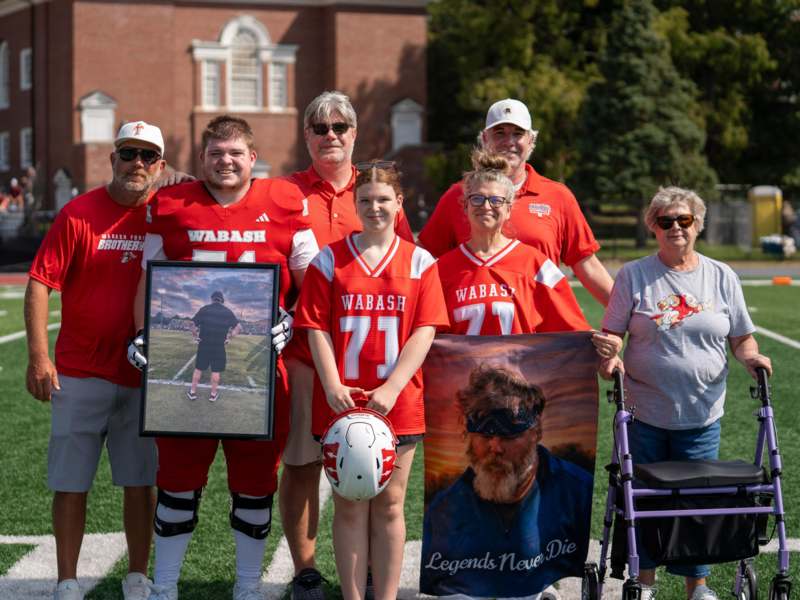 a group of people posing for a photo