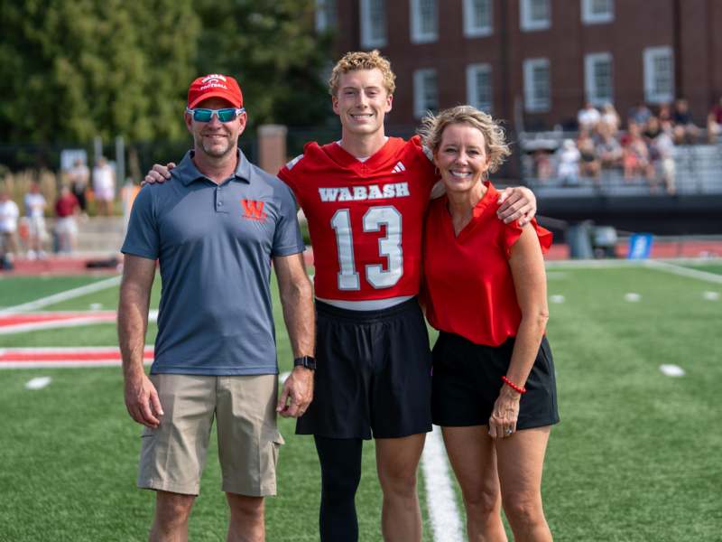 a group of people on a football field