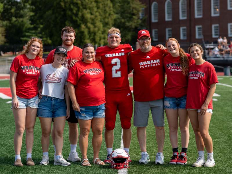 a group of people posing for a photo