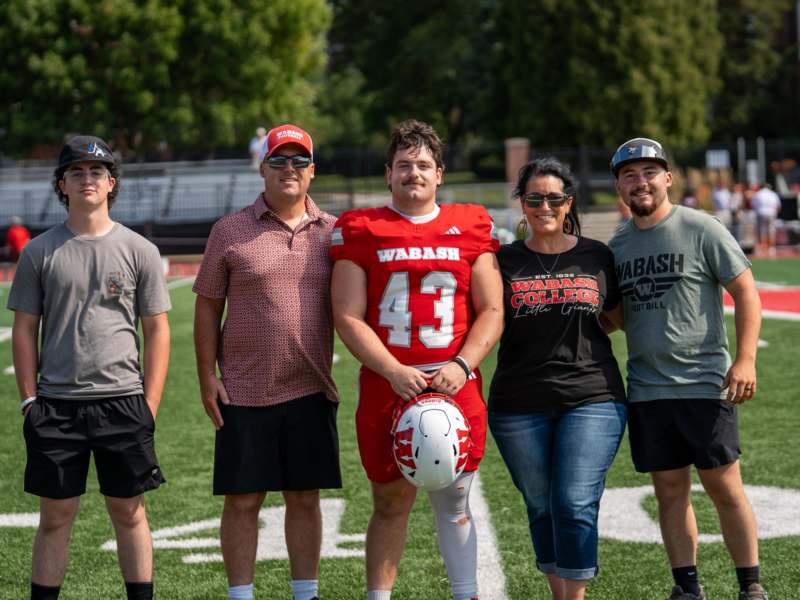 a group of people on a football field