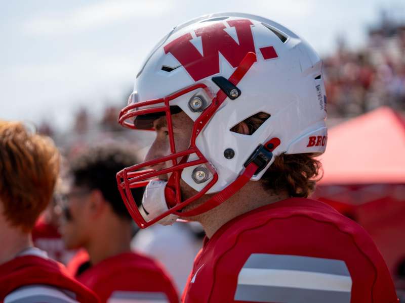 a football player wearing a helmet