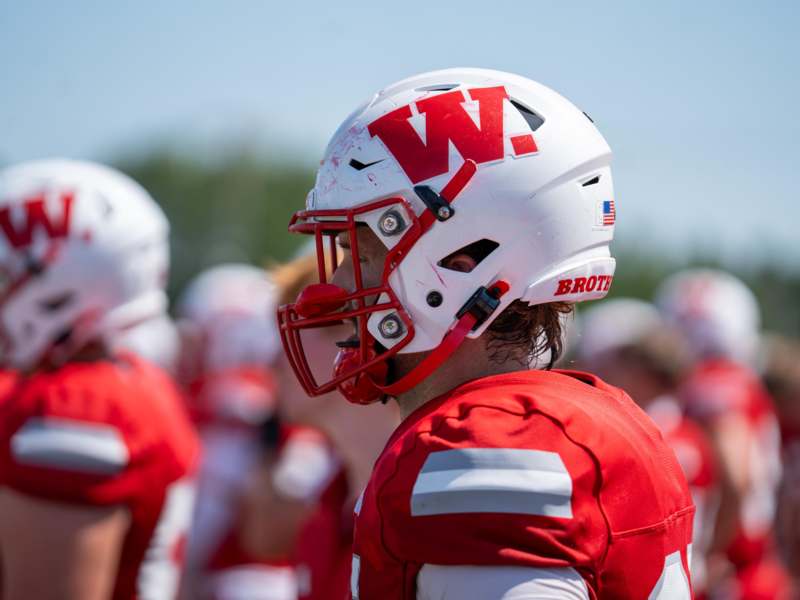 a football player wearing a helmet