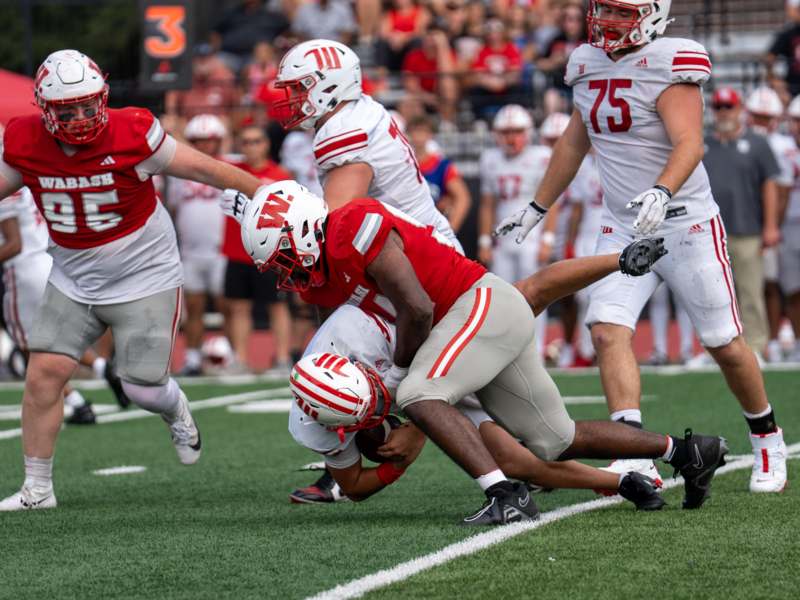 a football player falling down to the ground