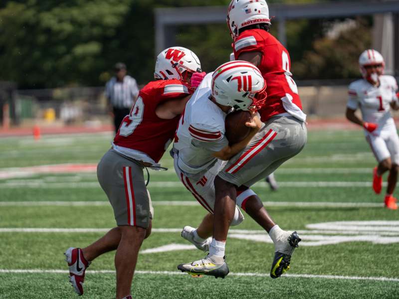 a group of football players on a field