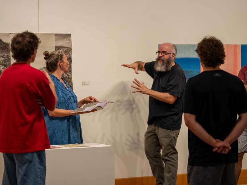 a group of people standing in a room