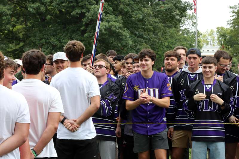 a group of people standing in a line