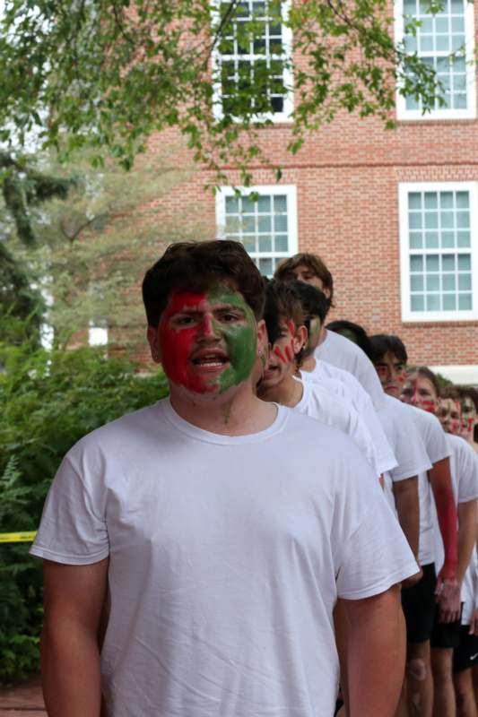 a group of people with paint on their faces
