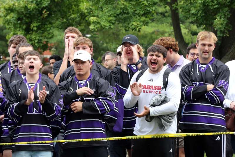 a group of people in sports uniforms