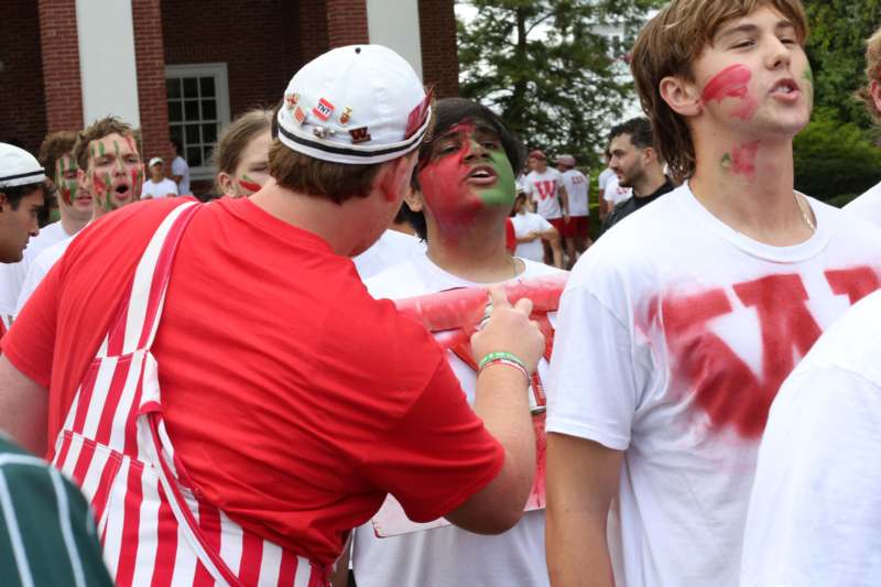 a group of people with paint on their faces