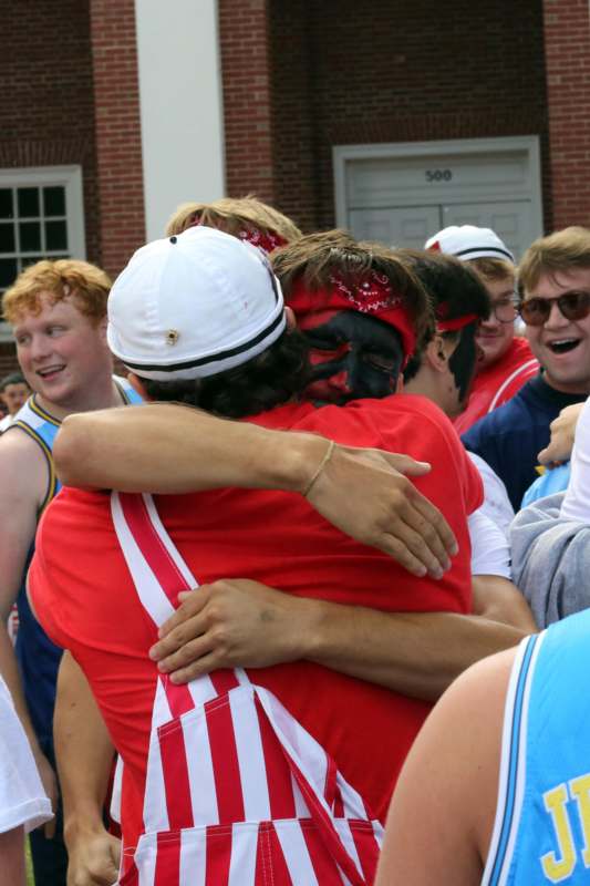 a group of people hugging