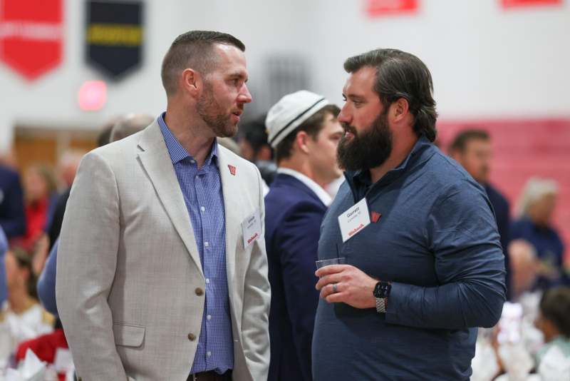 a group of men talking