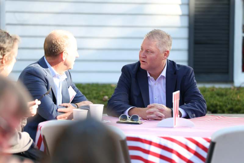 two men sitting at a table