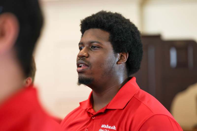 a man in a red shirt