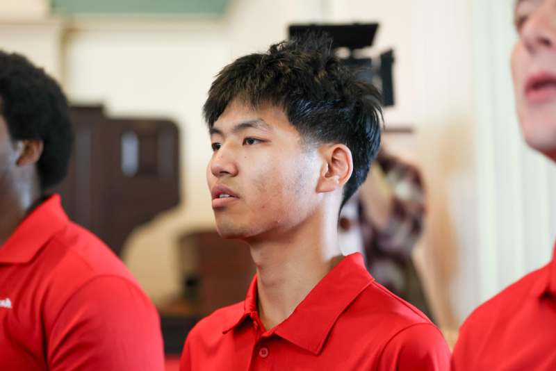 a man in a red shirt