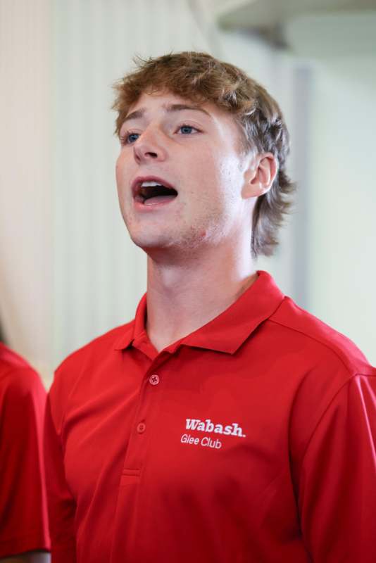 a man in a red shirt
