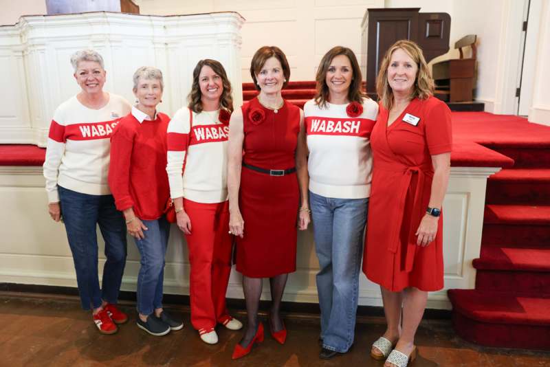 a group of women posing for a photo
