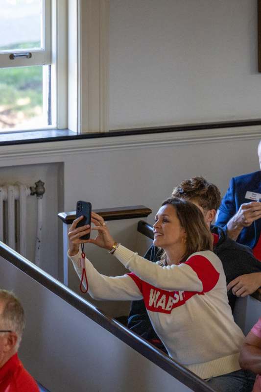 a woman taking a selfie