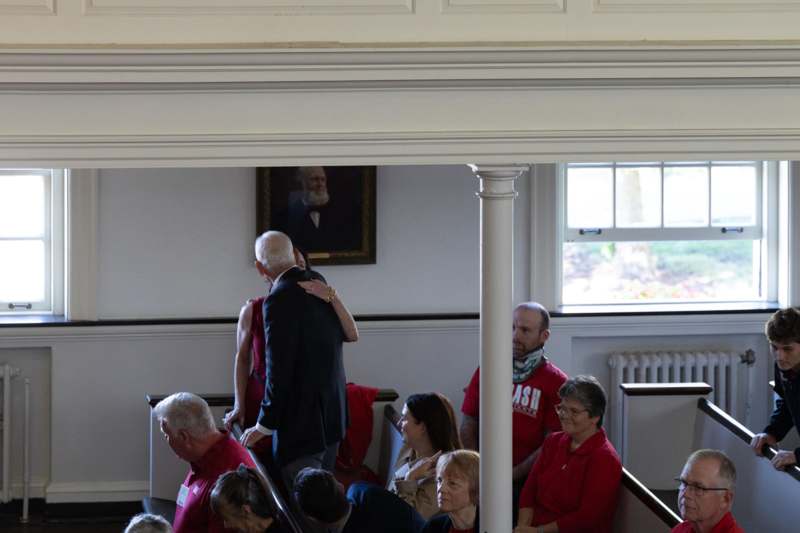 a group of people sitting on stairs
