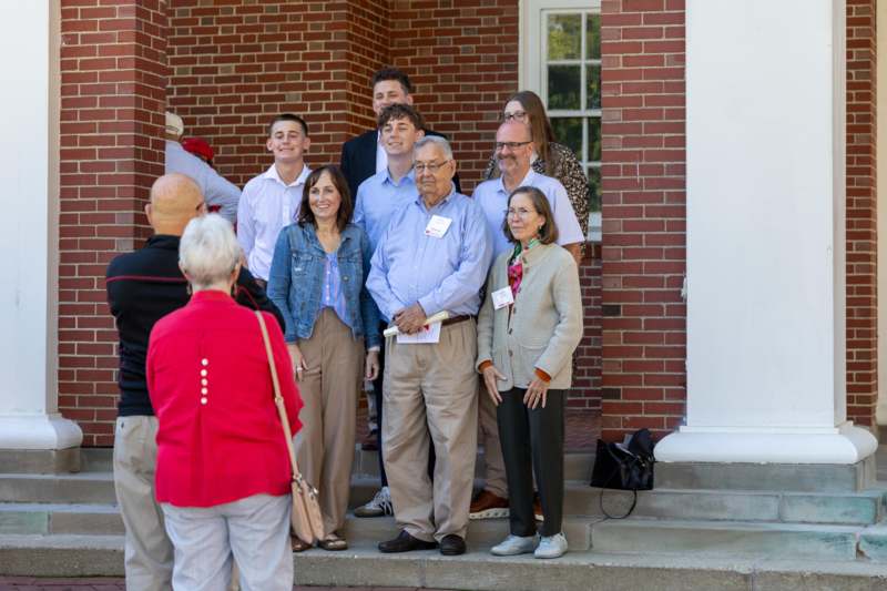 a group of people standing outside a building