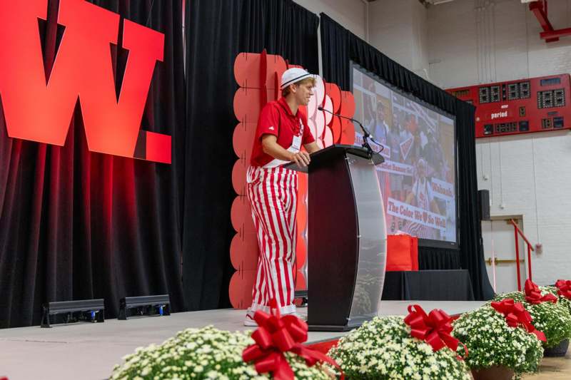 a man standing at a podium