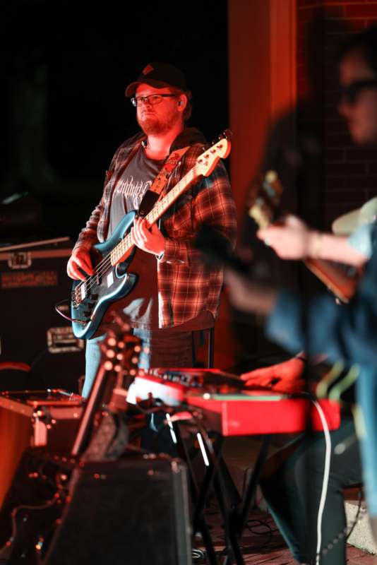 a man playing a guitar