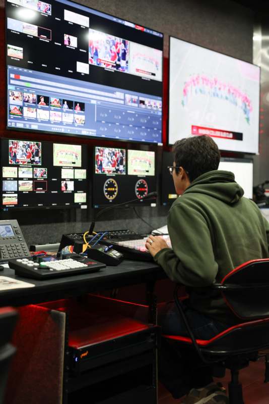 a man sitting at a control room