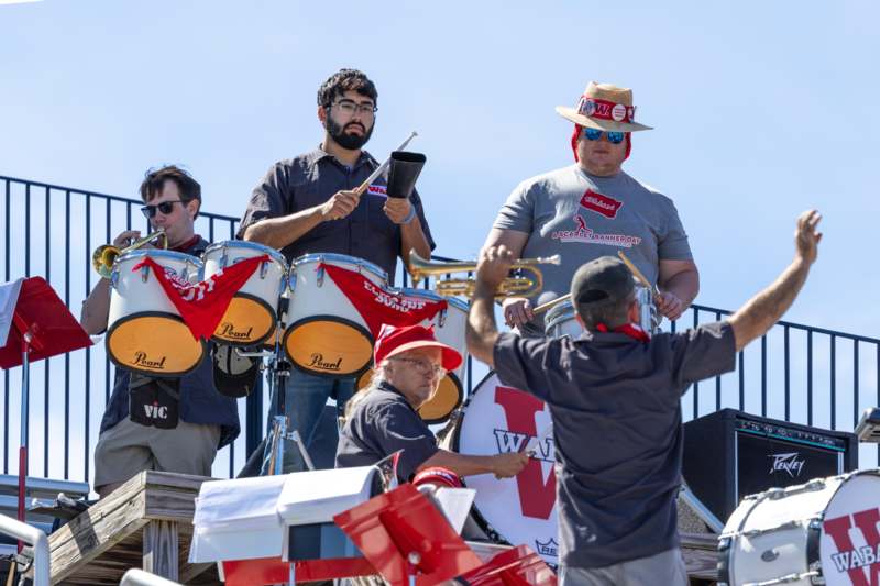 a group of people playing instruments