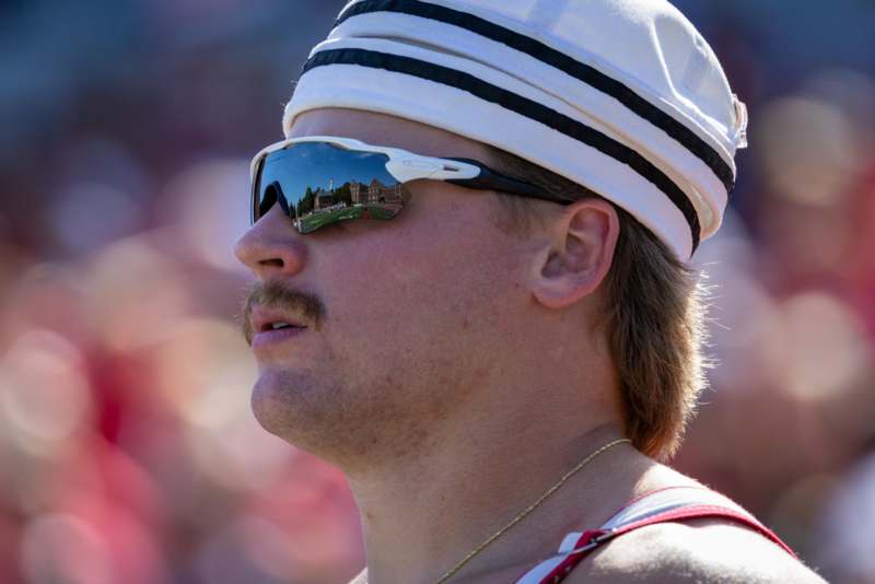 a man wearing sunglasses and a hat