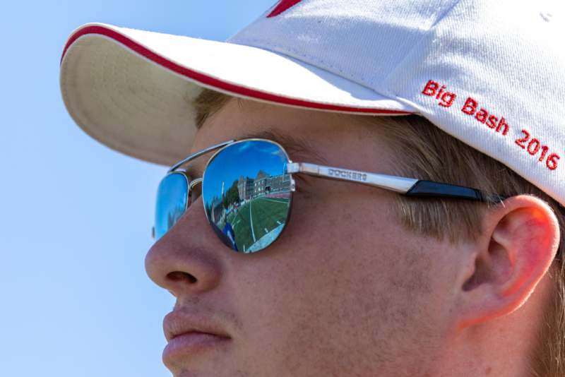 a man wearing sunglasses and a hat