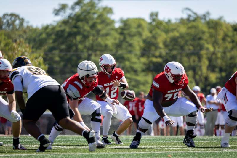 a group of football players on a field