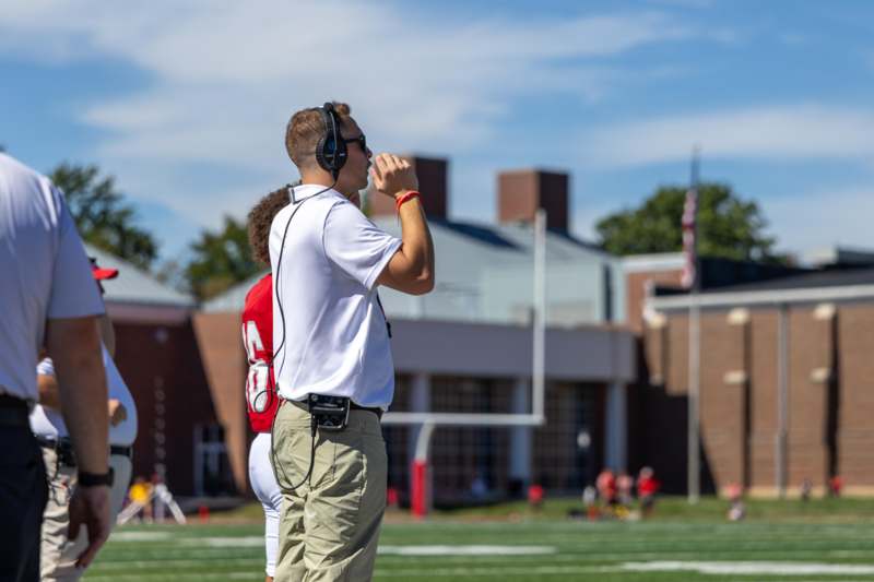 a man standing on a football field